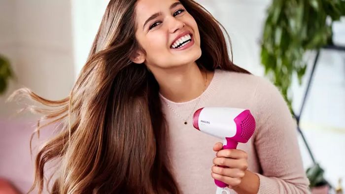 Фен Philips DryCare Essential дорожній, 1400Вт, 2 режими, хол. обдув, рожевий